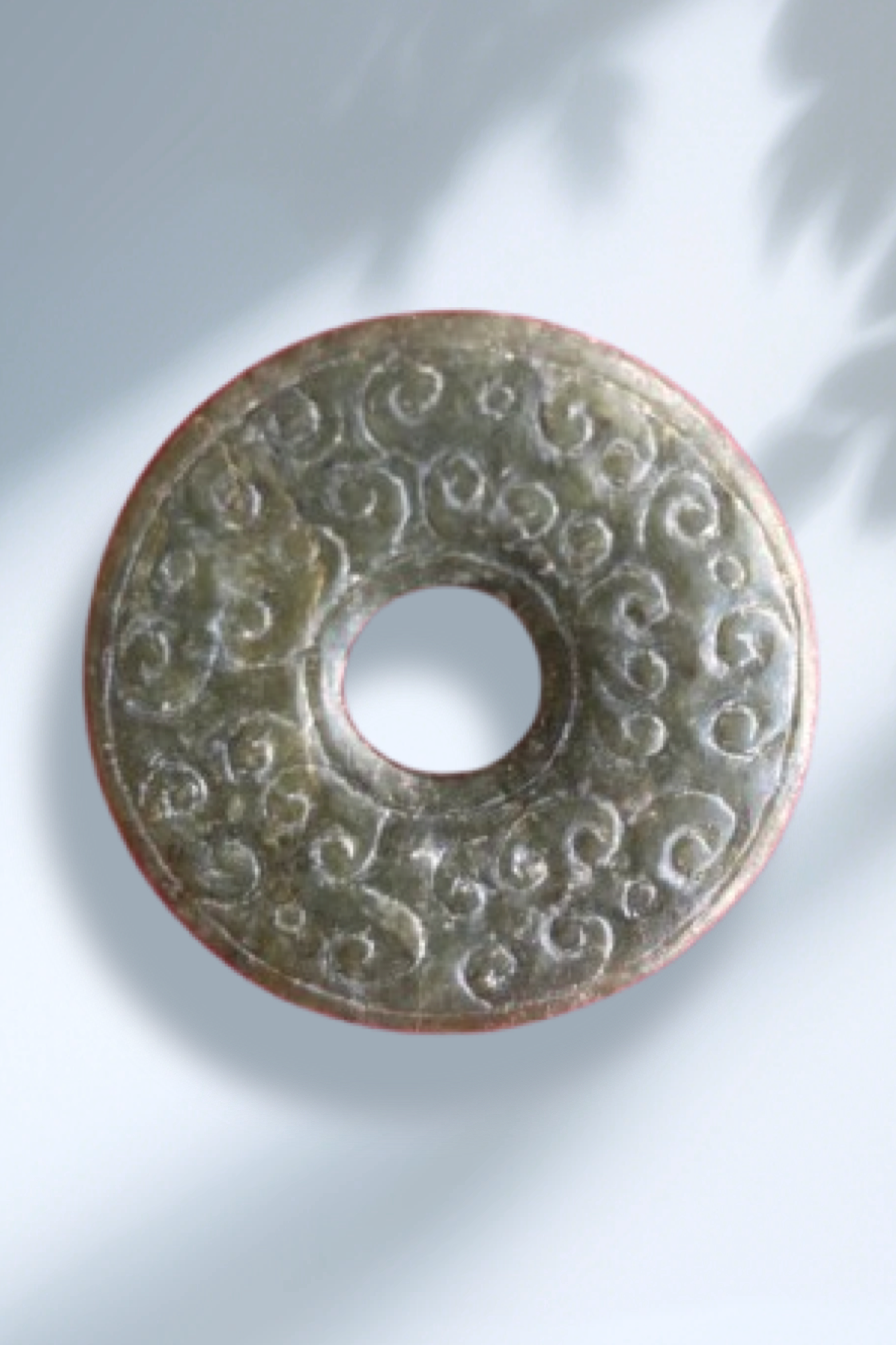 Spring and Autumn Period Cloud Pattern Green Jade Pendant